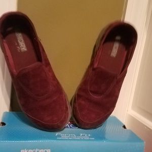 Burgundy Skechers sneakers